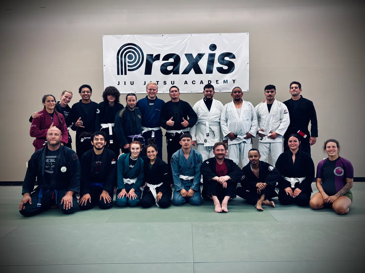 Praxis students and coaches gathered for a group photograph